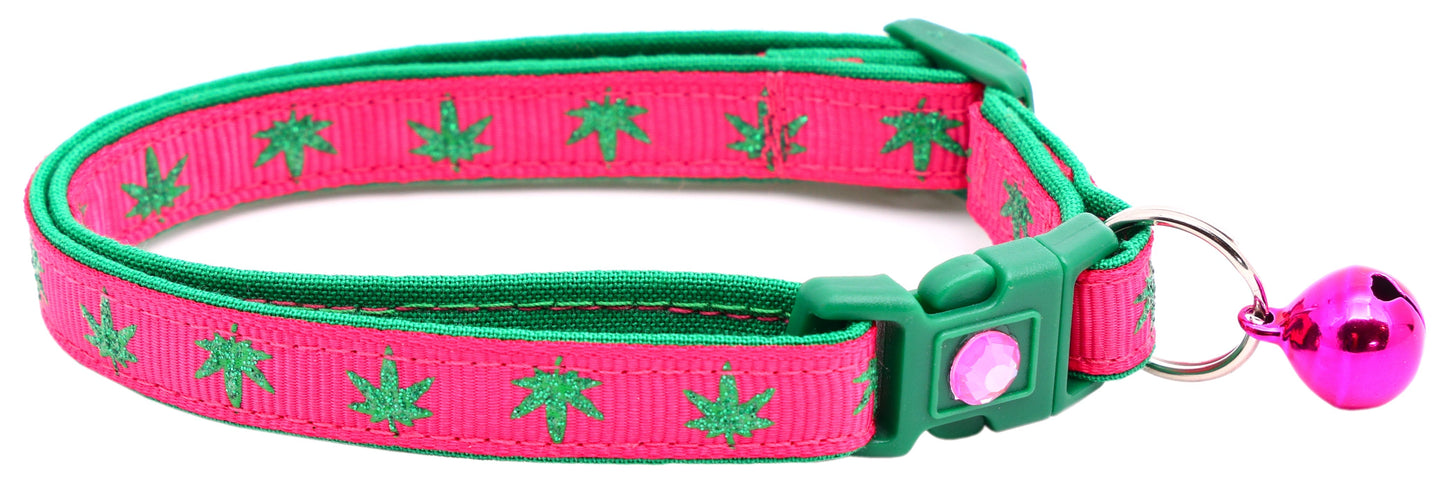 Tail Chasers safe adjustable cat collar for pets in pink with green leaf pattern and bell