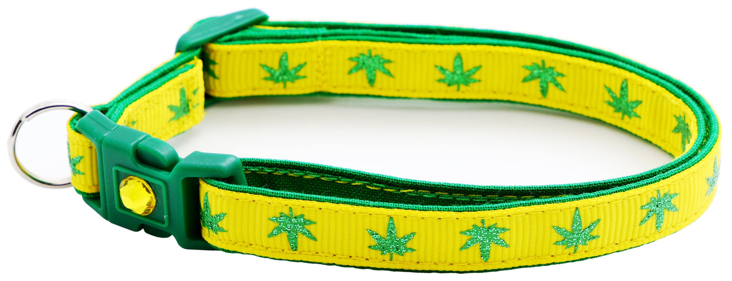 Tail Chasers safe adjustable cat collar for pets in yellow with green leaf pattern