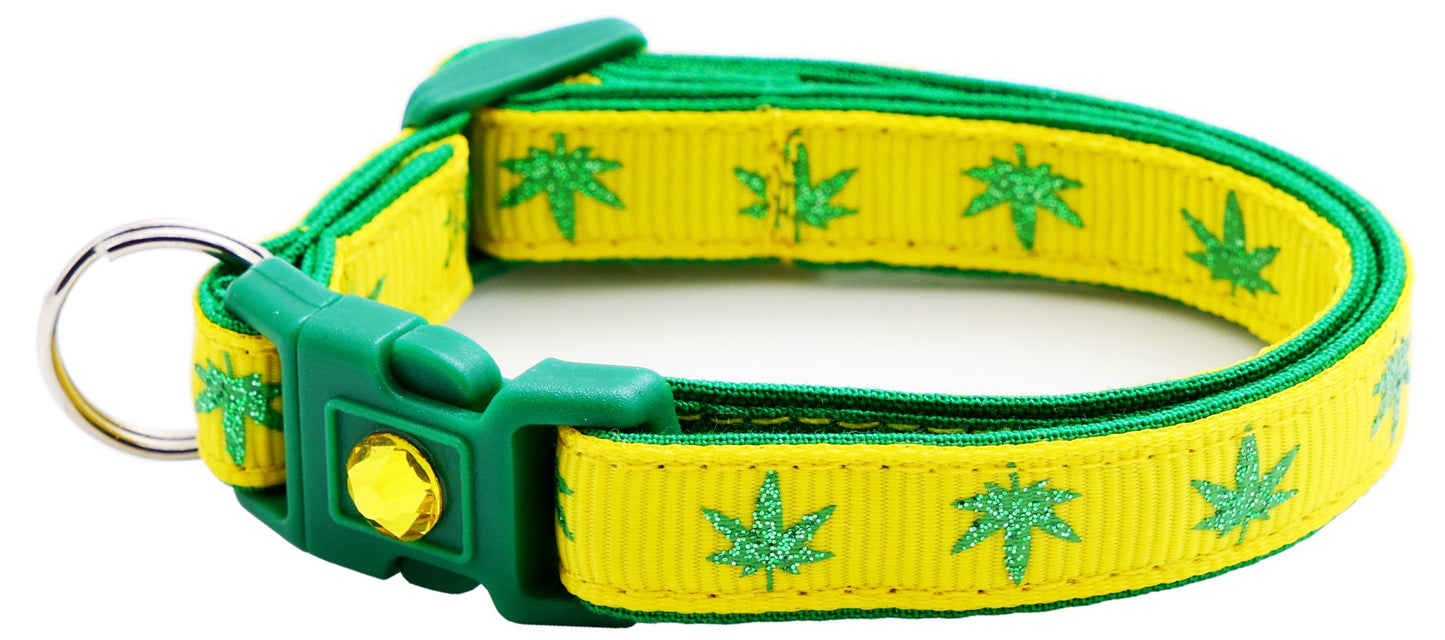 Tail Chasers safe adjustable cat collar for pets in yellow with green leaf design
