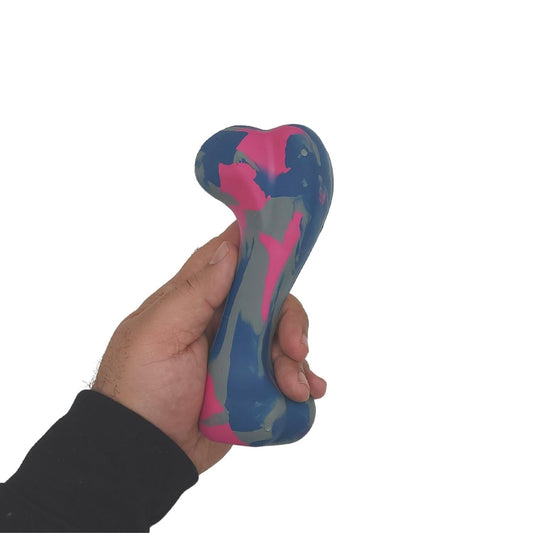 Hand holding a colorful safe interactive dog bone toy for fun and entertainment