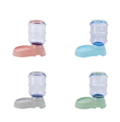 Purrfect Pet Kingdom self-dispensing pet waterer in pink blue gray and green for automated pet hydration