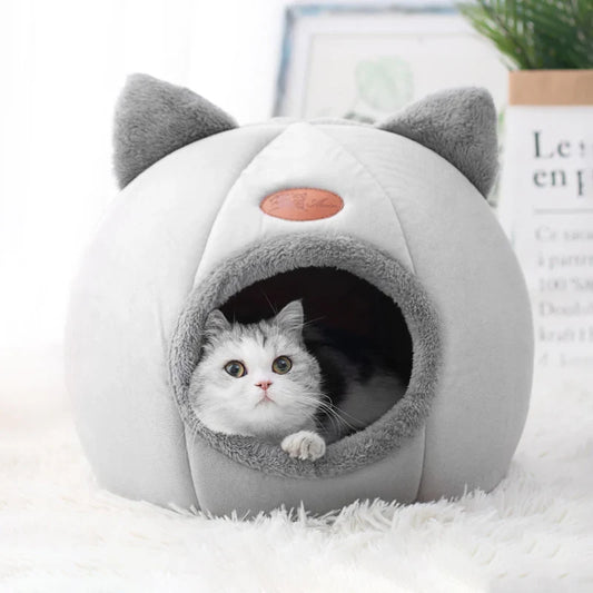 Cozy gray soft cat bed for cold weather with cute ear design and plush interior for comfort