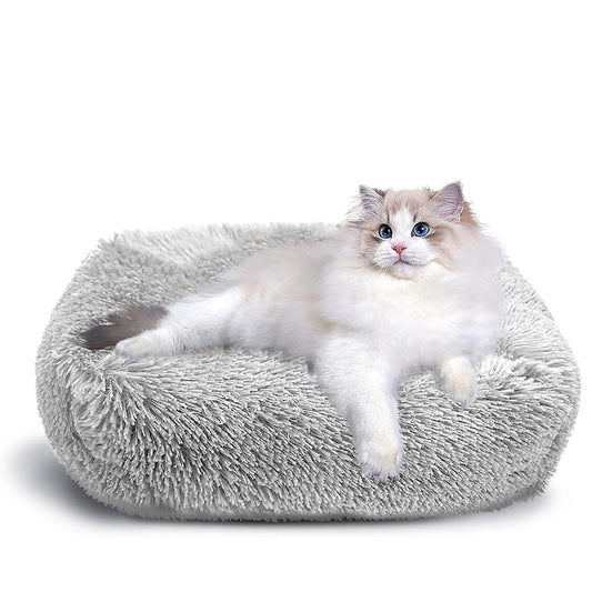 Soft cozy cat bed in gray with plush texture for ultimate comfort for your feline friend