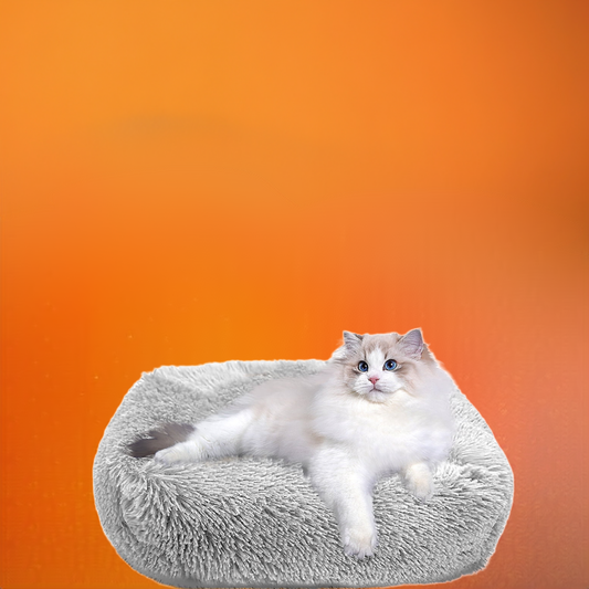 Soft cozy cat bed in gray with plush texture, perfect for providing comfort to your feline friend.