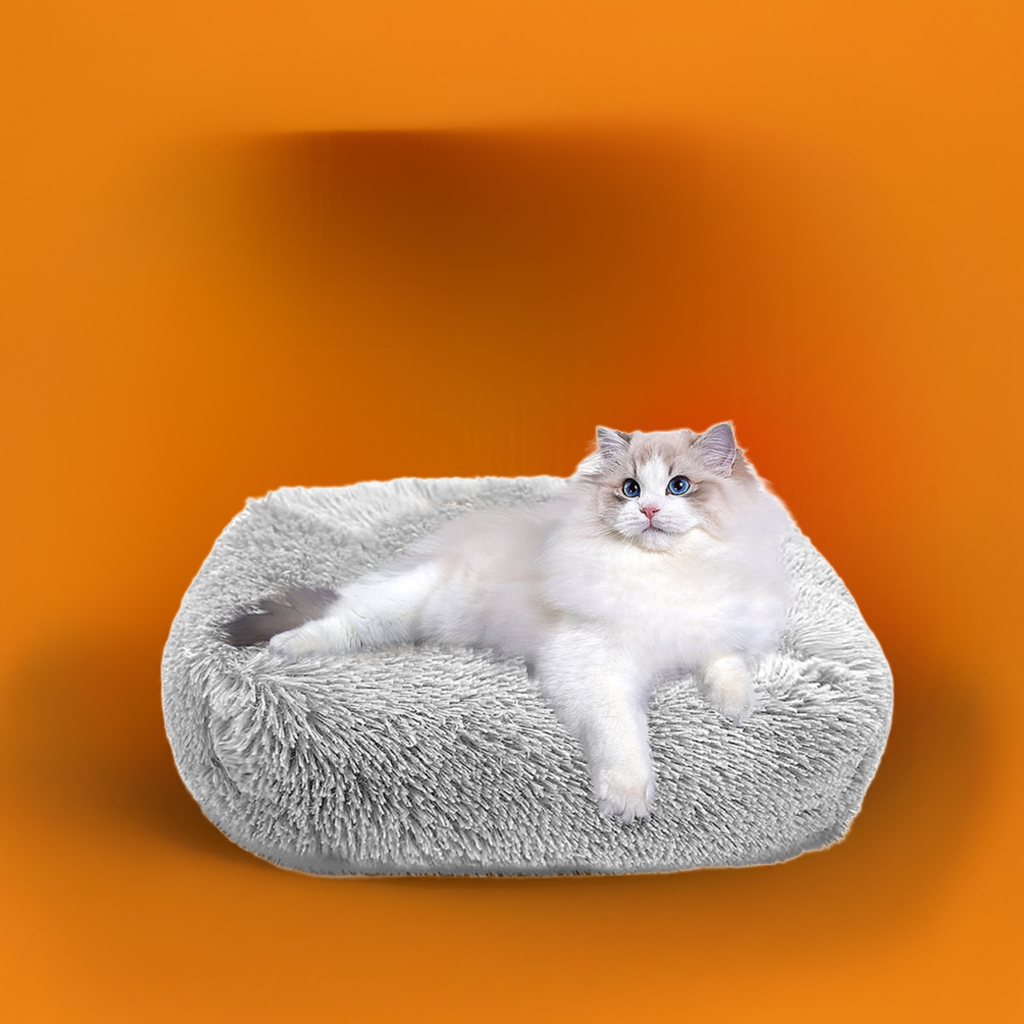 Soft cozy cat bed in gray with a fluffy texture, perfect for pampered cats to relax comfortably