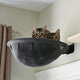 Space-saving cat furniture by Tail Chasers with two cats resting comfortably on a wall-mounted perch