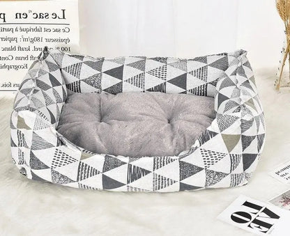 Purrfect Pet Kingdom spill-resistant cat bed with geometric pattern and plush gray cushion for cozy royal kitties