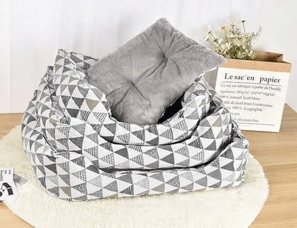 Purrfect Pet Kingdom cozy spill-resistant cat bed with gray geometric pattern and soft cushion