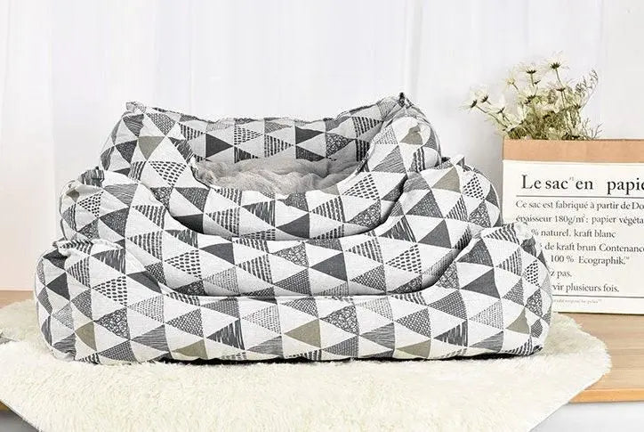 Cozy spill-resistant cat bed by Purrfect Pet Kingdom with geometric gray and white pattern