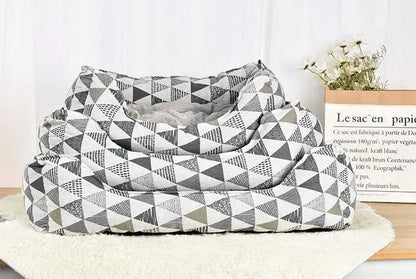 Cozy spill-resistant cat bed by Purrfect Pet Kingdom with geometric gray and white pattern