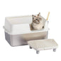 Stainless steel cat litter box with high-sided white cover and beige cat sitting inside by Purrfect Pet Kingdom
