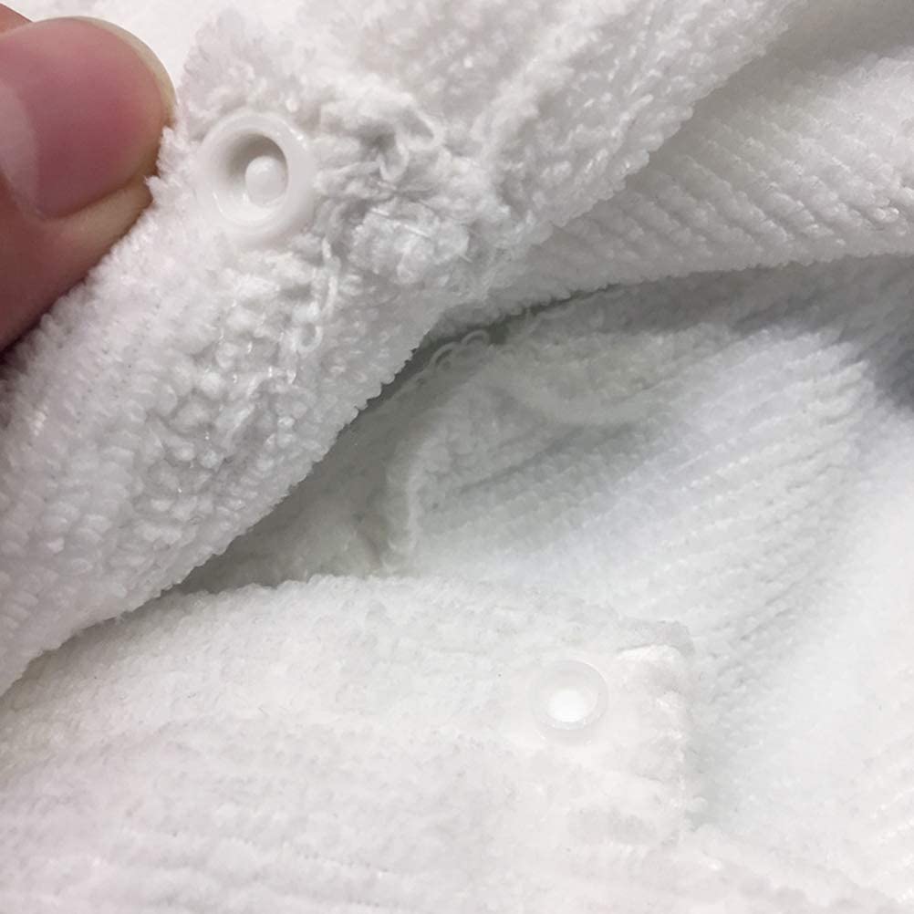 Close-up of white dog hooded bathrobe fabric with secure snap buttons for easy dressing