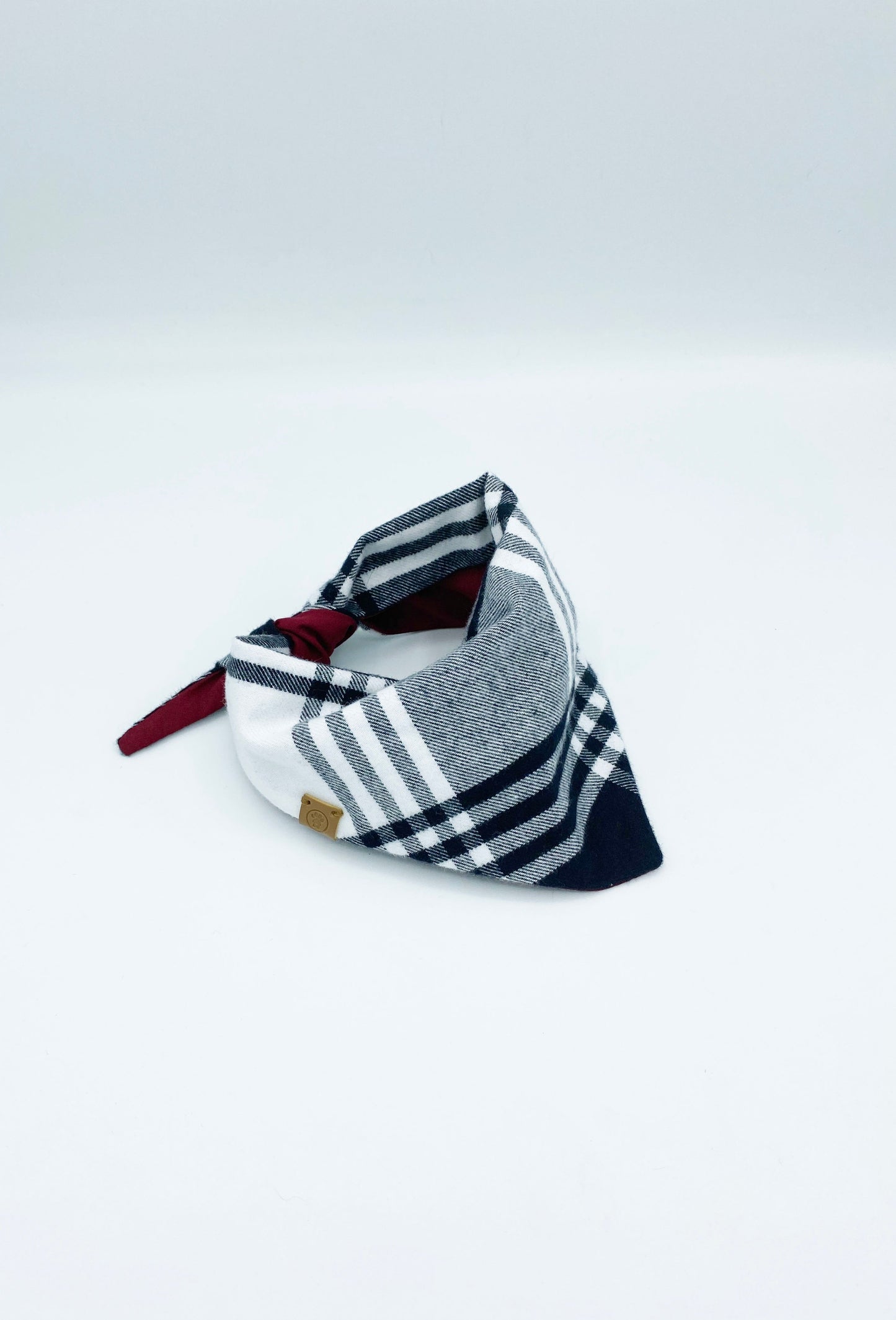 Stylish cat bandana in gray and white plaid design for fashionable feline friends