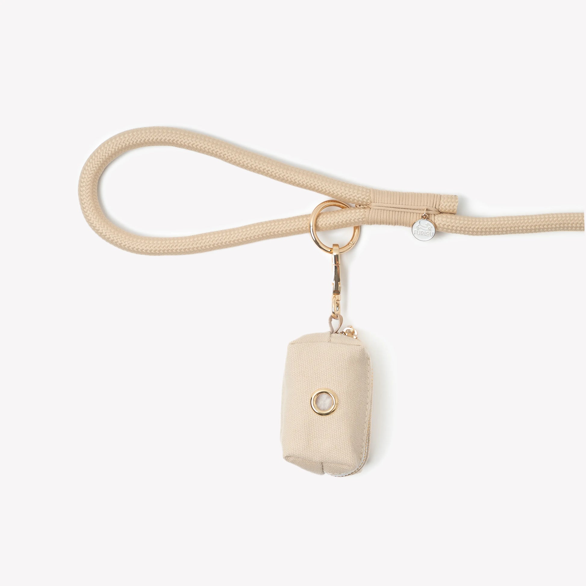 Tan FURLOU Poop Bag Holder, ideal for dog owners, features a compact design perfect for on-the-go pet waste disposal.