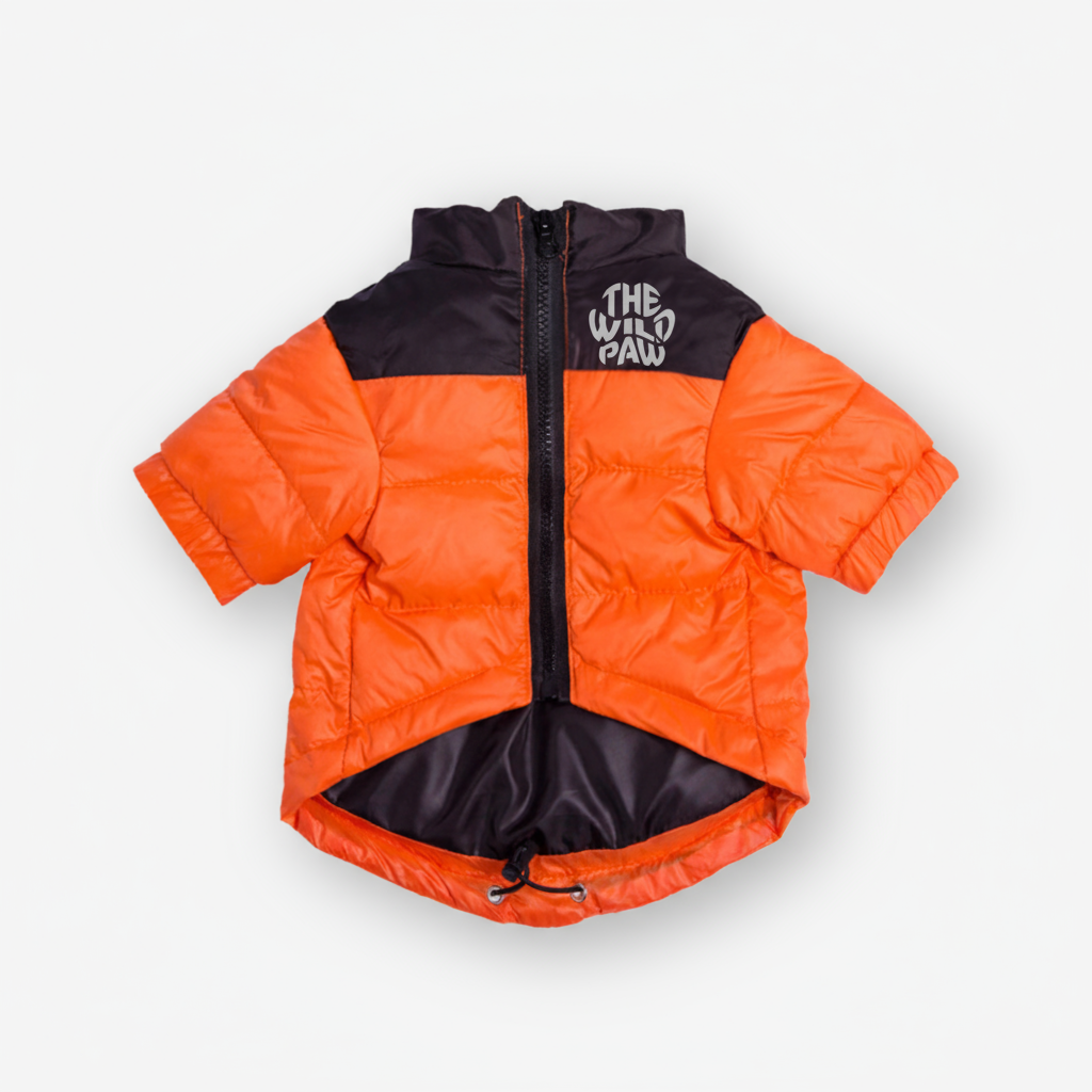 The Wild Paw insulated dog jacket in bright orange with a durable zipper and adjustable fit