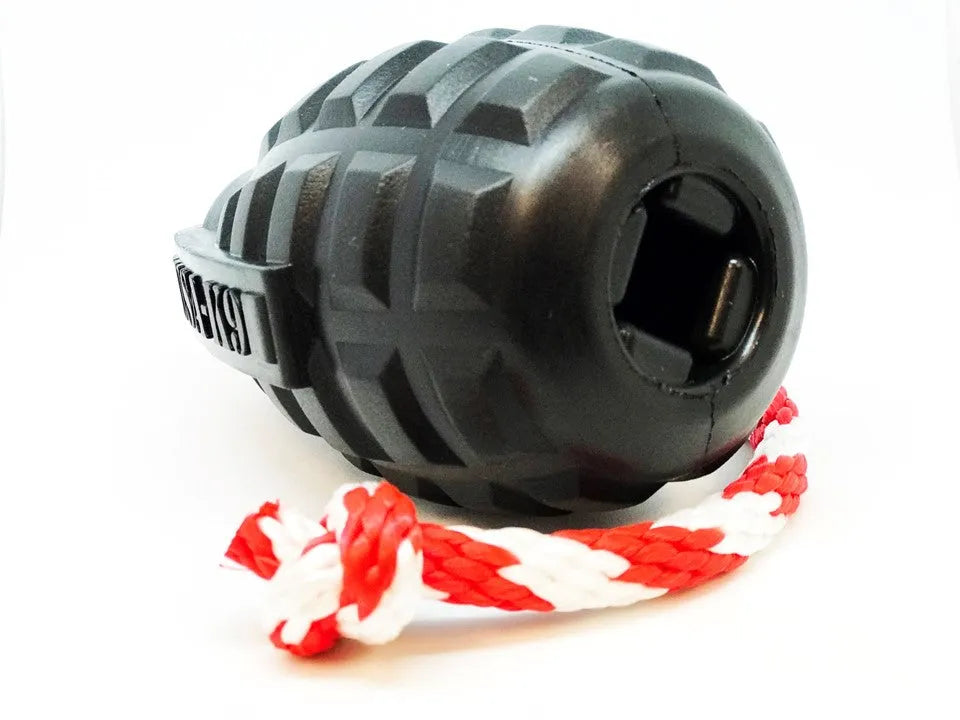 USA-K9 Magnum Grenade in black, a durable rubber chew toy by SodaPup for extreme chewers, available in medium and large si...