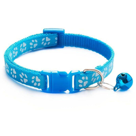 Purrfect Pet Kingdom stylish blue dog collar with white paw prints and attached blue bell