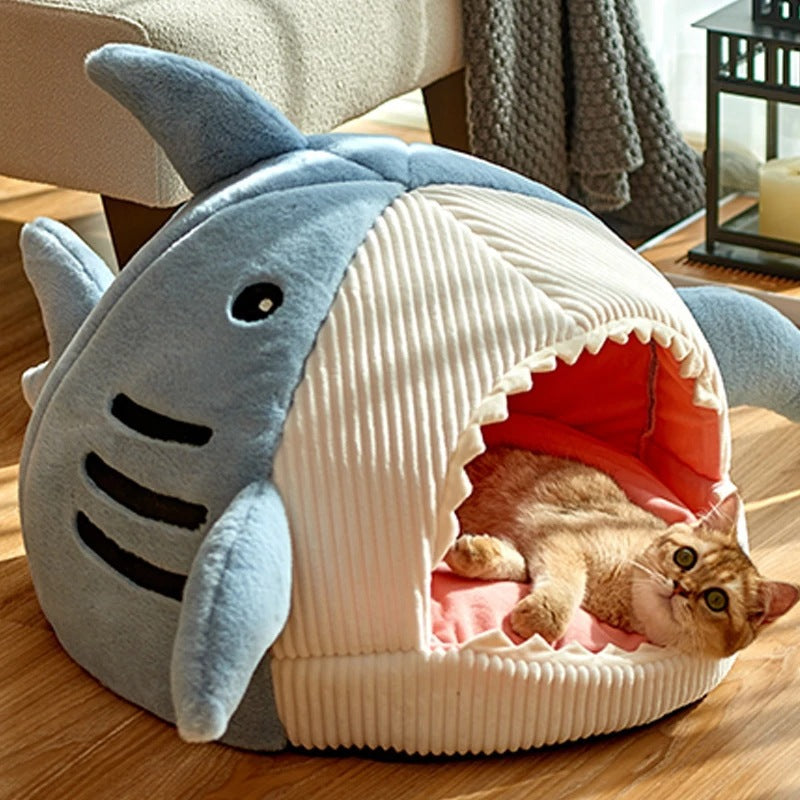 Cute shark-shaped warm enclosed pet bed for small animals with a cozy interior for comfort
