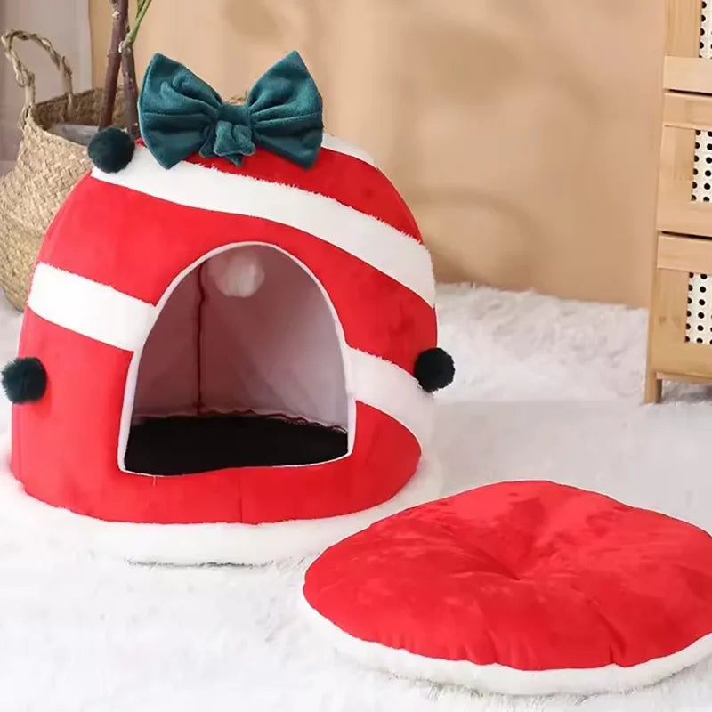 Warm holiday cat house in red and white stripes with a bow and removable cozy cushion