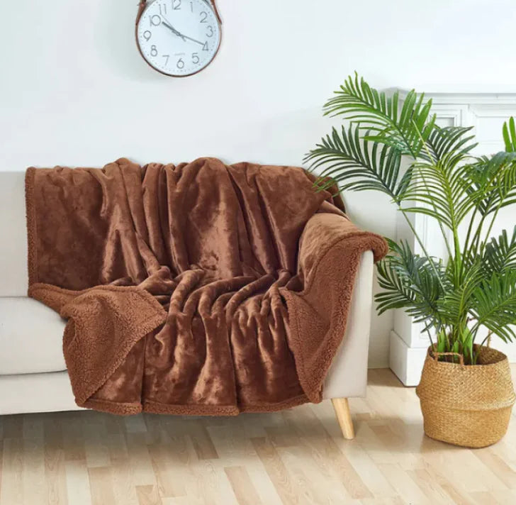 Soft brown washable pet furniture mat on a couch for easy cleaning and pet comfort