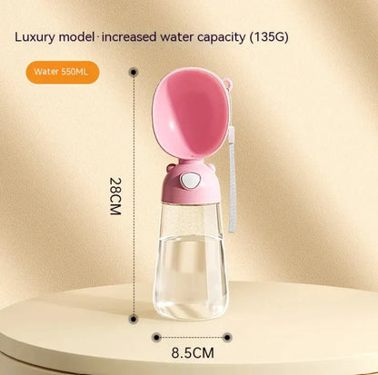 Mimarta pink and clear 550ml portable dog water bottle with built-in drinking bowl and wrist strap.