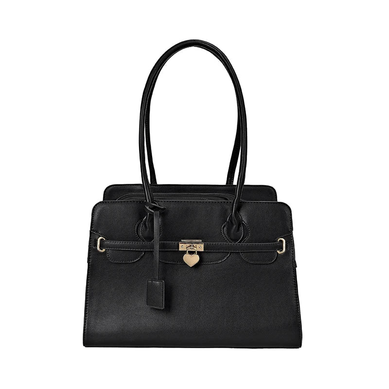 Stylish black leather cat carrier tote with elegant design and comfortable shoulder straps