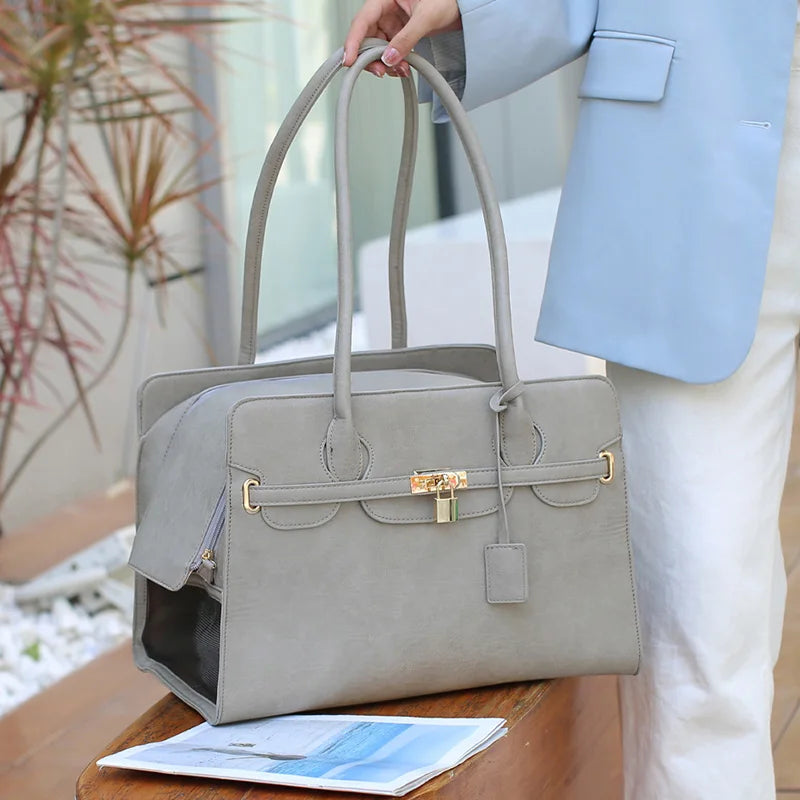 Stylish Tail Chasers leather cat carrier tote in gray with comfortable handles for easy transport