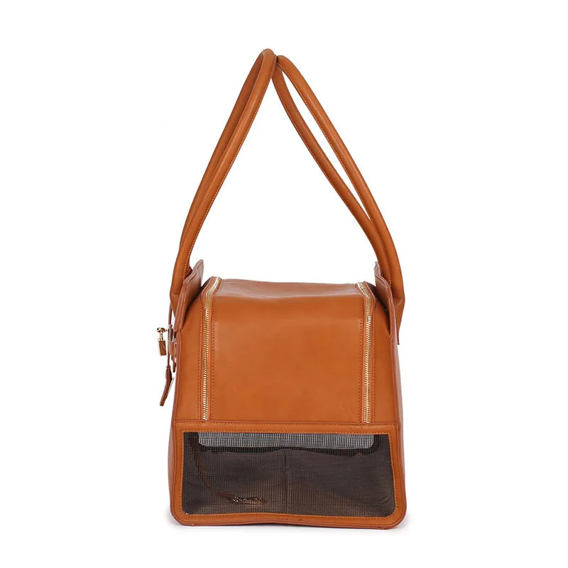 Tail Chasers leather cat carrier tote with a stylish design and mesh ventilation for comfort